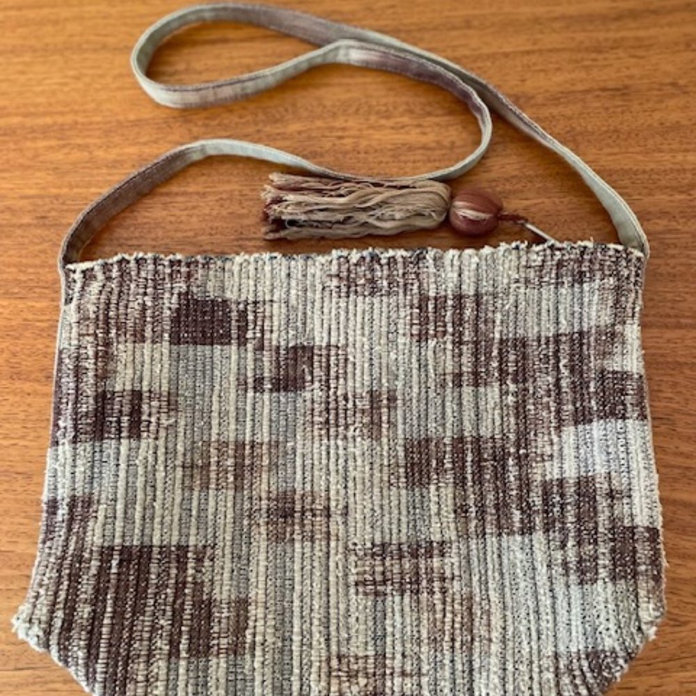 Beige and brown woven handbag